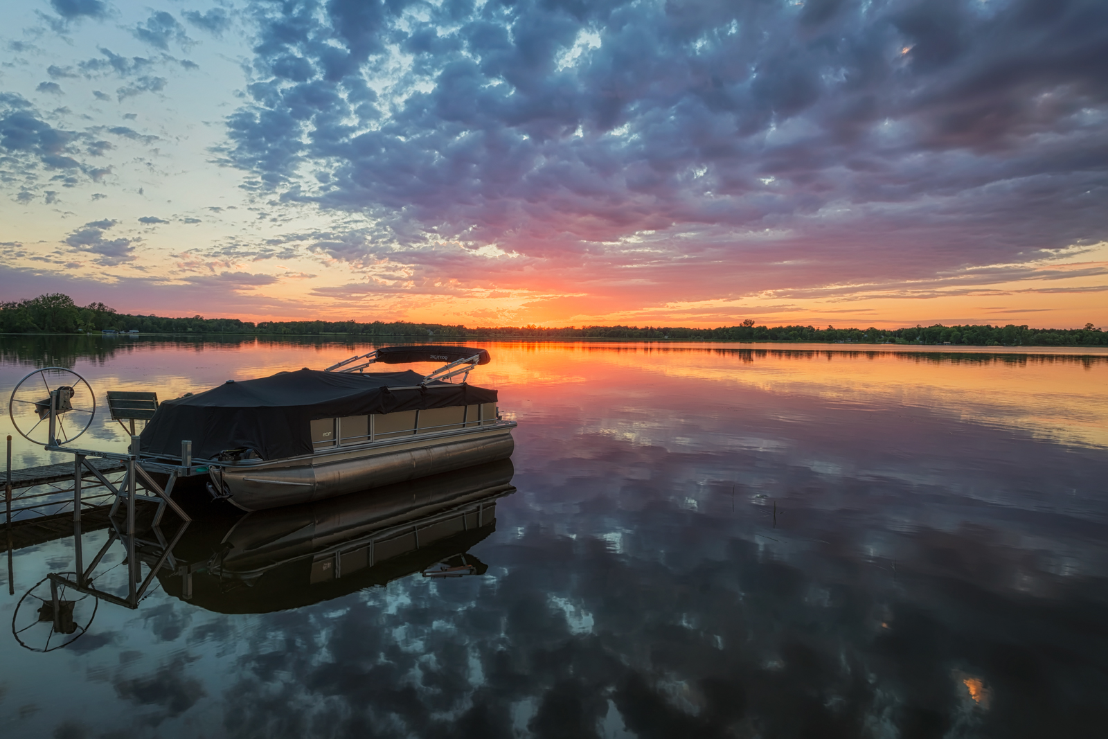 Pontoon Boat at Sunset on Dead Lake, Minnesota