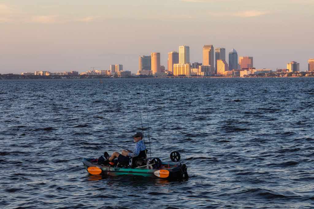 Kayaker in front of Tampa Skyline