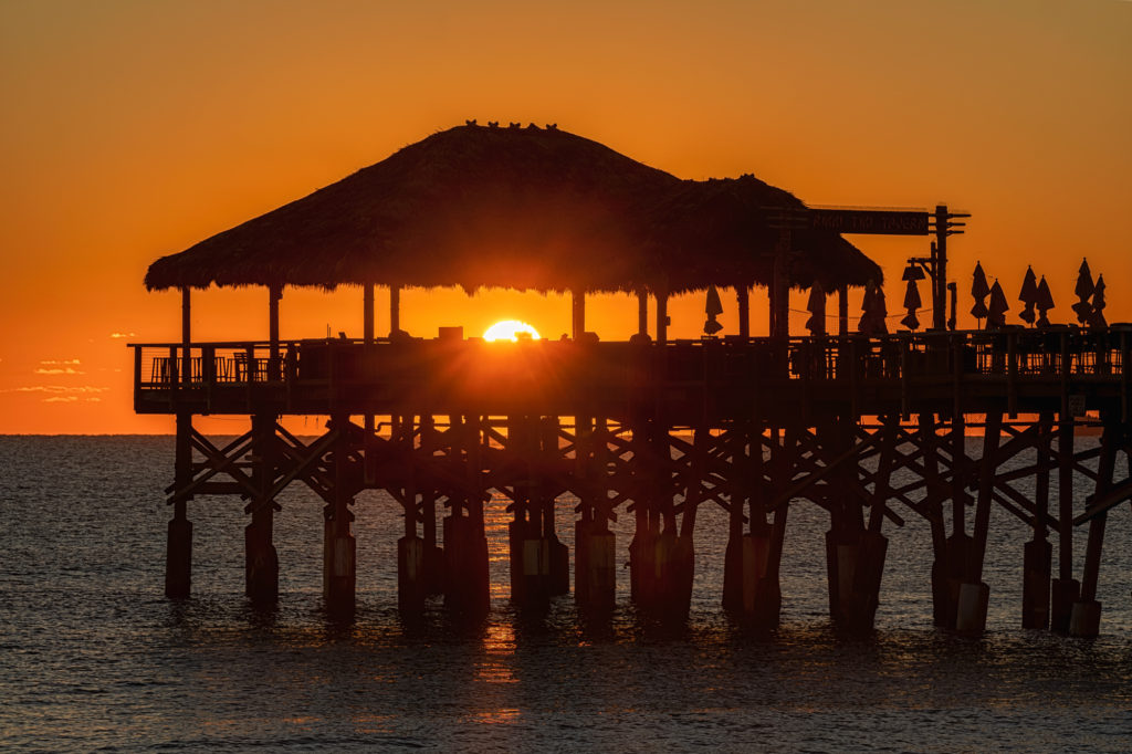 Sunrise Shining Through Cocoa Beach Pier